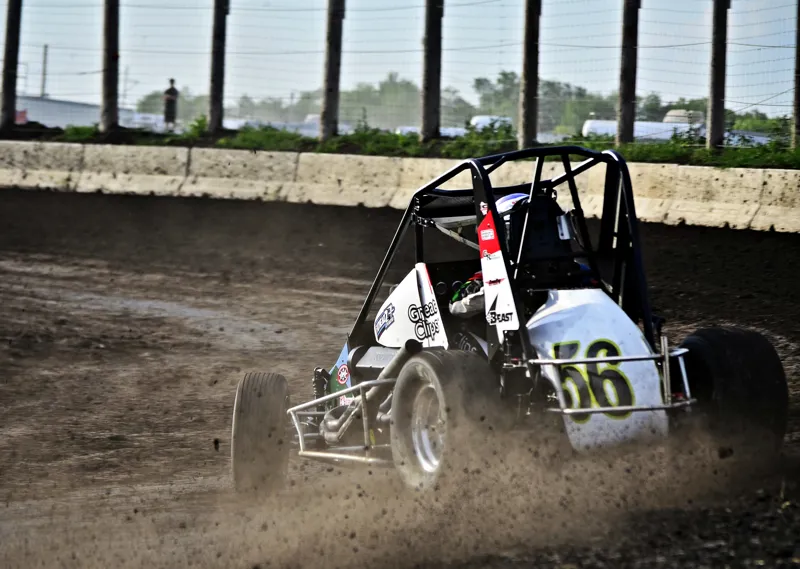 Darren driving the Great Clips #56 Midget Car